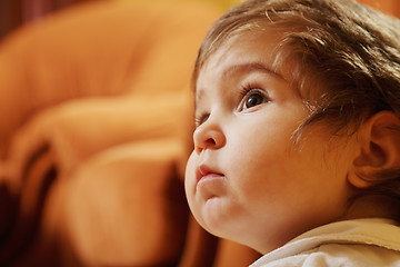 Image showing Cute little girl looking up