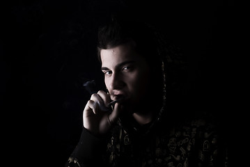 Image showing portrait of a young man with cigarette  