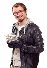 Image showing Warmly Dressed Handsome Young Man with Gift