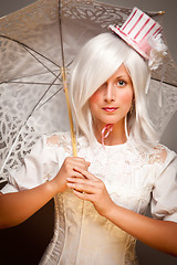 Image showing Pretty White Haired Woman with Parasol and Classic Dress