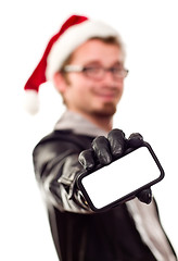 Image showing Man with Santa Hat Holding Out Blank Cell Phone