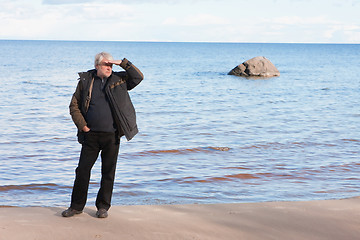 Image showing Middle-aged man at the sea.