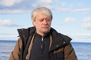 Image showing Middle-aged man at the sea.