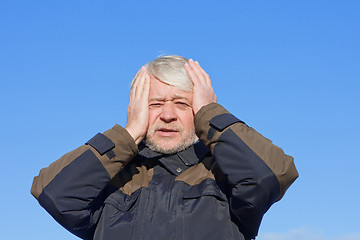 Image showing Portrait of middle-aged man on blue sky of the background.