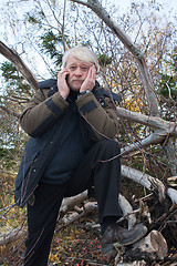 Image showing Mature middle-aged man in forest.