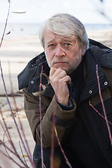 Image showing Middle-aged man at the sea.