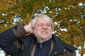 Image showing Portrait of middle-aged man in autumn day.