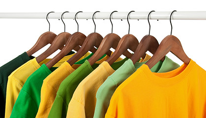 Image showing Choice of green and yellow casual shirts