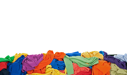 Image showing Messy colorful clothes border with space for text