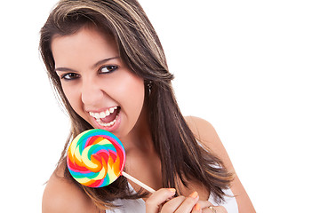 Image showing beautiful young woman with a lollipop