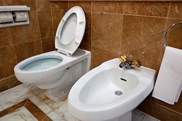 Image showing Toilet and bidet in hotel bathroom