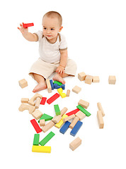 Image showing Little boy playing with blocks