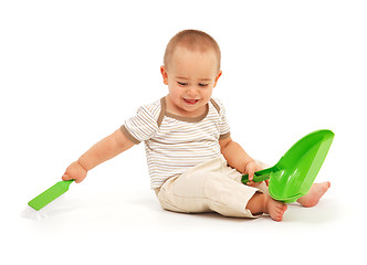 Image showing Little boy sweeping