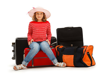 Image showing Young girl with luggages