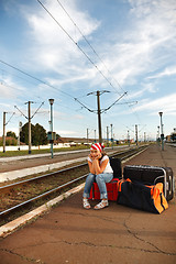 Image showing Young girl in train station