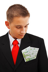Image showing Man looking at money