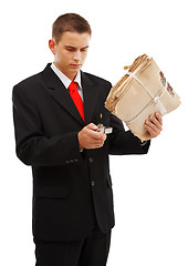 Image showing Young man burning file folder