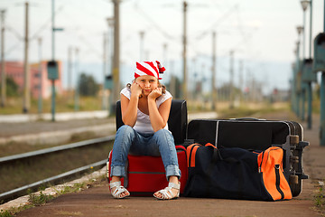 Image showing Young girl in train station