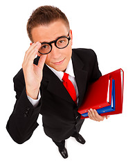 Image showing Young man with folders