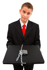 Image showing Man holding a locked computer