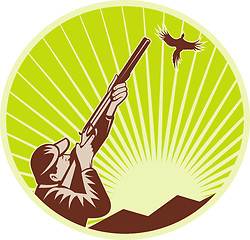 Image showing Hunter with shotgun  rifle aiming