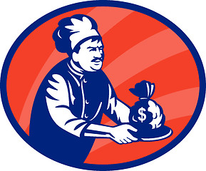 Image showing Baker chef or cook serving up bag of money