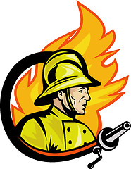 Image showing Fireman or firefighter with fire hose