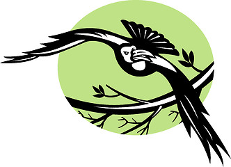 Image showing Raven bird flying with branch