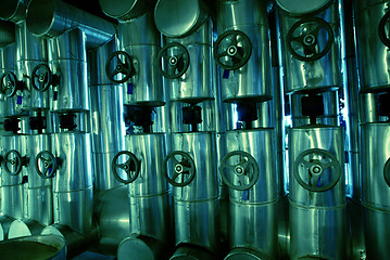 Image showing different size and shaped pipes and valves at a power plant 