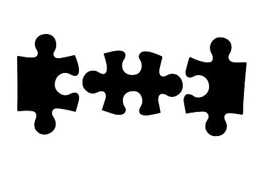 Image showing three different black puzzle pieces