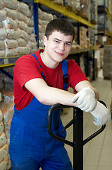 Image showing smiley worker at warehouse