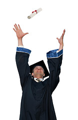 Image showing graduate in cloak throwing diploma