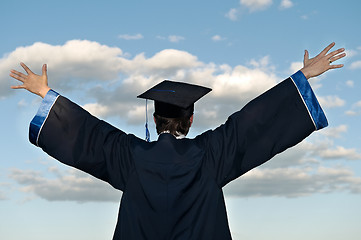 Image showing happy graduate with risen arms
