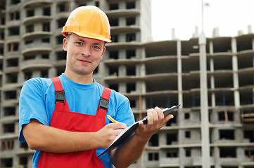 Image showing Builder satisfied inspector at construction area