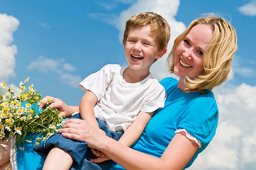 Image showing laughing mother and son