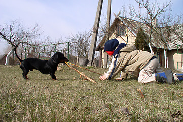 Image showing Child and Dog