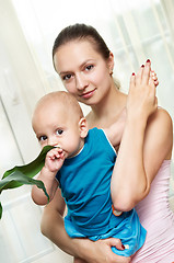 Image showing Mother and child in her hands