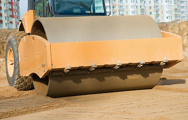 Image showing soil vibration compactor at work