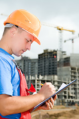 Image showing Inspector at construction area