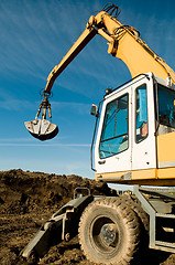 Image showing wheel loader excavator at work