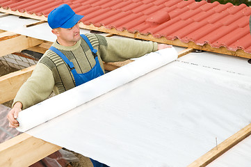 Image showing roofing works with protective layer foil