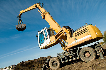 Image showing wheel loader excavator at work