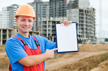 Image showing Smiley builder with clipboard