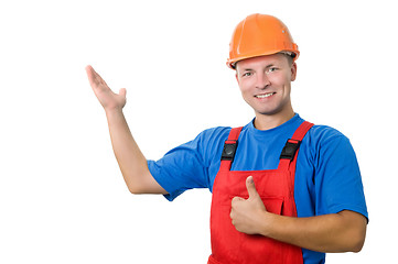 Image showing builder in uniform pointing up