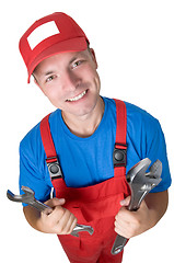 Image showing Smiley repairman with spanners