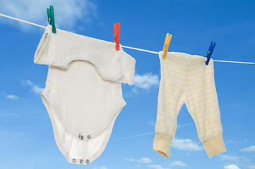 Image showing chilld infant linen on a clothesline