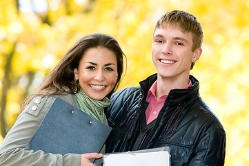 Image showing Portrait of happy students outdoors