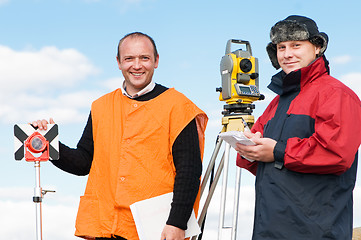 Image showing surveyor workers with theodolite equipment