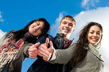 Image showing Group of smiling young students outdoors