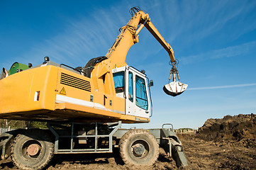 Image showing wheel loader excavator at work